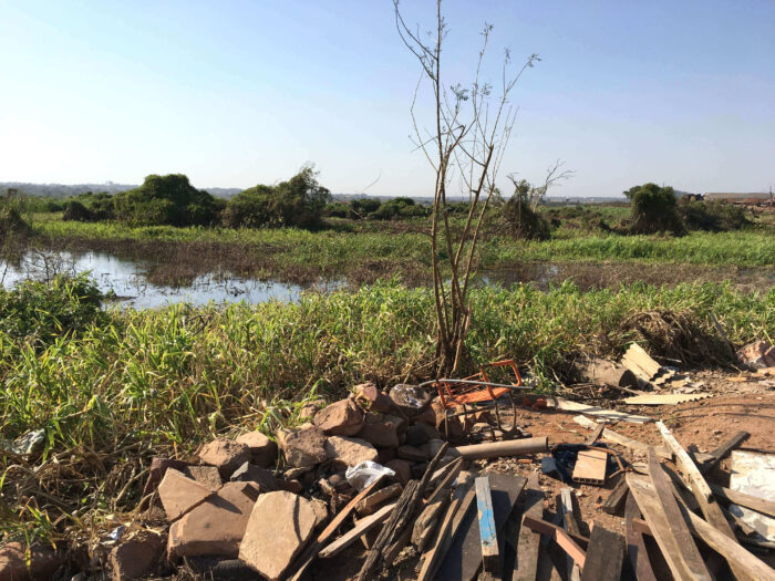Rubble next to a river in Paraguay