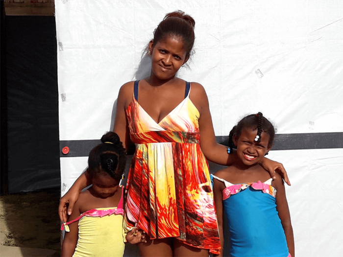 A woman with two children