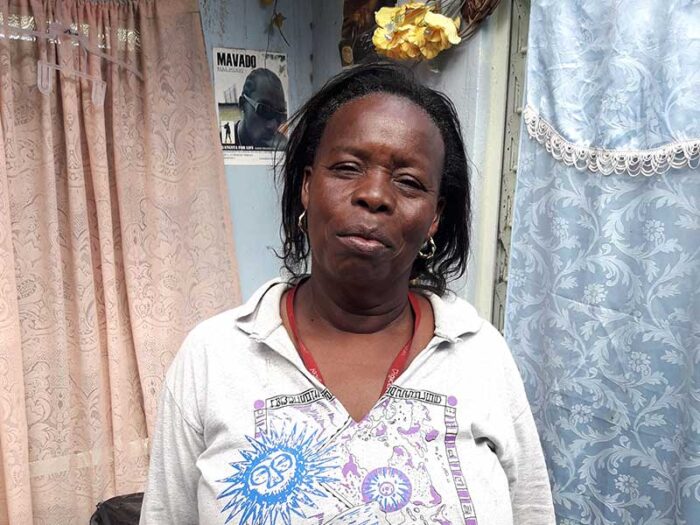 Woman standing in her home