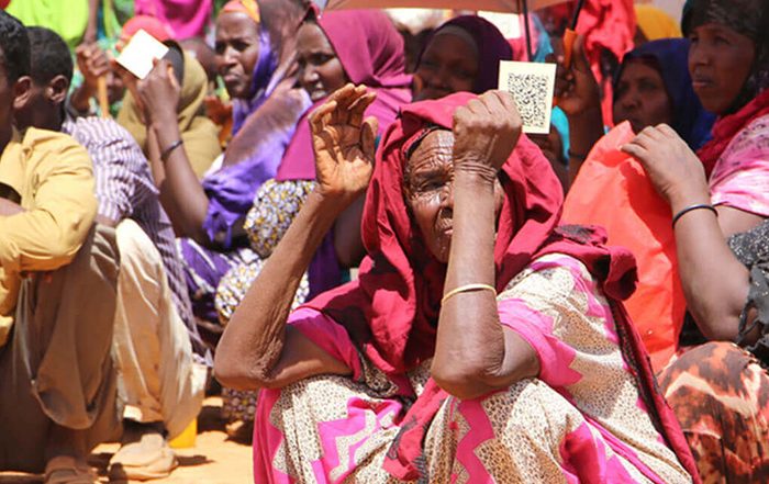 Group of people sitting on the floor in Somaliland