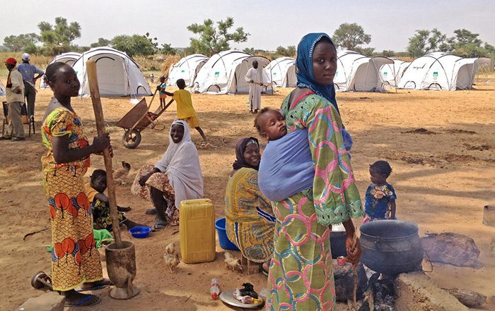 Woman and family outside in Niger